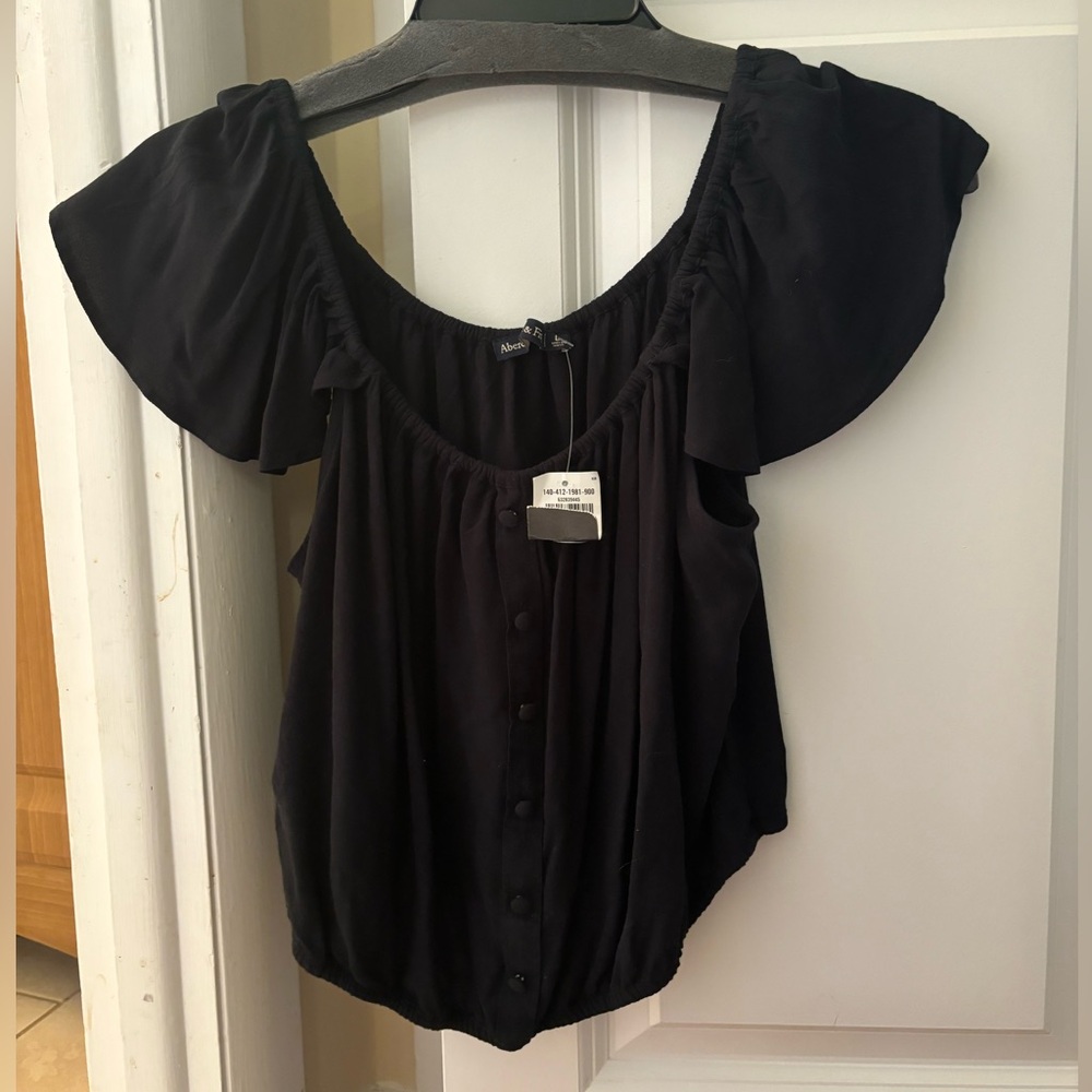 Off the shoulder black blouse, never worn size large
